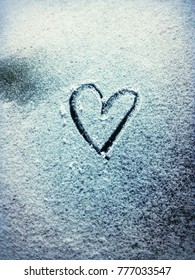 Snow Heart On The Car Window