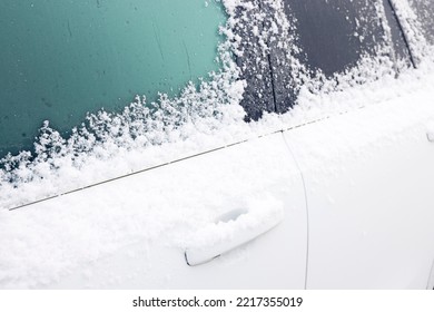 Snow And Ice Covering A Car In Winter, UK Snowy Scene