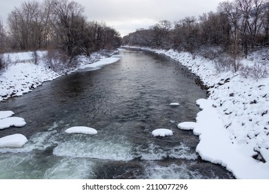 Snow And Ice On The Okanagan River In British Columbia, Canada On A Winter Day