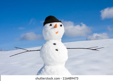 Snow Man On Nature In Sunny Cold Day