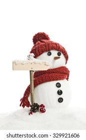 Snow Man With A Sign In A Artificial Winter Landscape