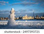 Snow man with skylines and Nyc as background