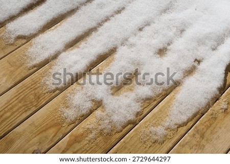 Snow melting on the backyard deck | Snow covered deck