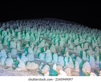 Snow Monsters (soft Rime) Illuminated By Colorful Lights At Night (Zao, Yamagata, Japan)