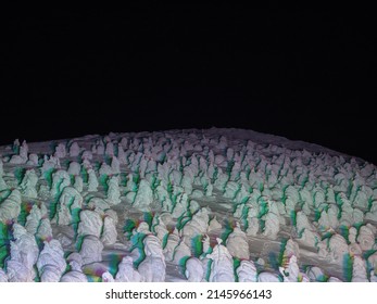 Snow Monsters (soft Rime) Illuminated By Colorful Lights At Night (Zao, Yamagata, Japan)