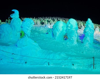 Snow Monsters (soft Rime) Illuminated By Colorful Lights At Night (Zao, Yamagata, Japan)