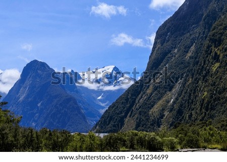 Snow mountai near milfordsound with blue sky in fine day in summer