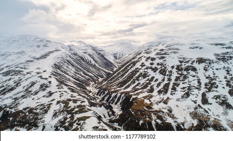 Snow Mountain In Iceland. Aerial View And Top View. Beautiful Nature Background.