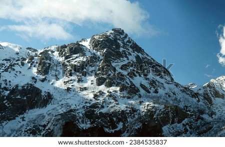 Snow mountain range against blue sky, Reine bay, Lofoten Islands, Norway, rock mountain, nature for background wallpaper or backdrop