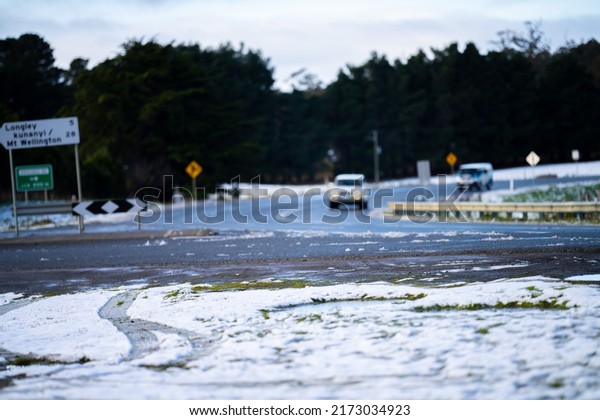 Snow near the road in Tasmania Australia, snow on\
vinces saddle near Hobart 