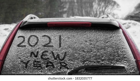 Snow On The Car Where The Numbers Are Written 2021.  Back Window Of The Car. 2021  Happy New Year