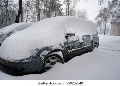 Snow On Cars After Snowfall. Winter Urban Scene.