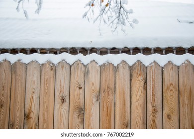 Snow On Fence.