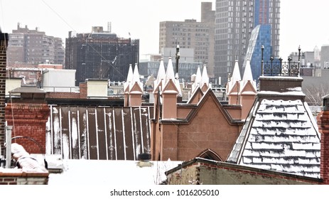 Snow on the rooftops of New York City. USA