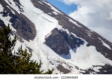 Snow On Steep Mountain Side