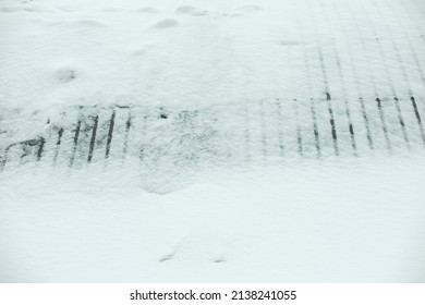 Snow On Wall. Snow Drift On Fence. Snowdrift Fell From Roof. After Snowstorm.