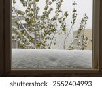 Snow on a windowsill during winter in Luoyang, China