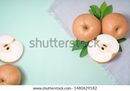 Snow pear or Korean pear on green background, Nashi pear fruits delicious and sweet