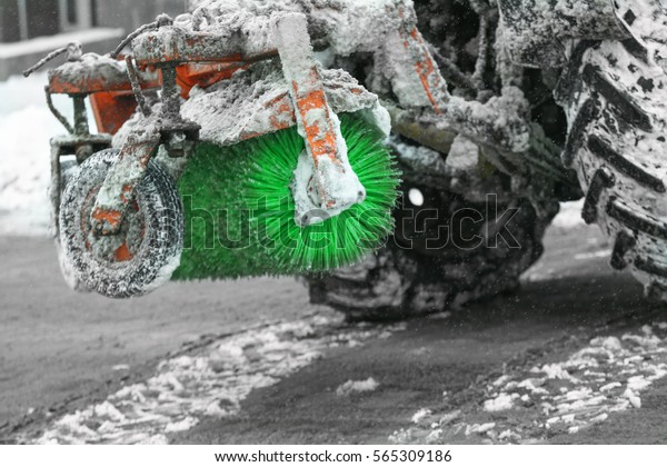 Snow plow outdoors cleaning\
street