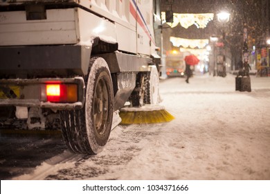 Snow Plow And Snow Truck Cleaning The Streets During A Snow Storm In Night Maintenance Action In Belgrade, Serbia