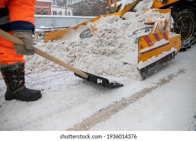 Snow Plow And Snow Truck Cleaning The Streets During A Snow Storm In Night Maintenance Action In Belgrade, Serbia