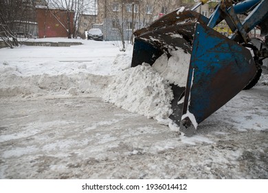 Snow Plow And Snow Truck Cleaning The Streets During A Snow Storm In Night Maintenance Action In Belgrade, Serbia