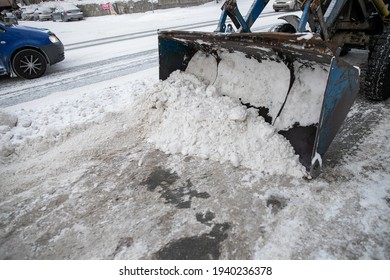 Snow Plow And Snow Truck Cleaning The Streets During A Snow Storm In Night Maintenance Action In Belgrade, Serbia