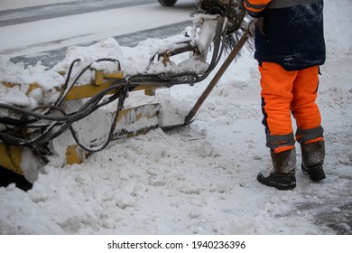 Snow Plow And Snow Truck Cleaning The Streets During A Snow Storm In Night Maintenance Action In Belgrade, Serbia