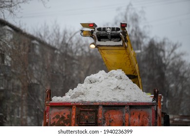 Snow Plow And Snow Truck Cleaning The Streets During A Snow Storm In Night Maintenance Action In Belgrade, Serbia