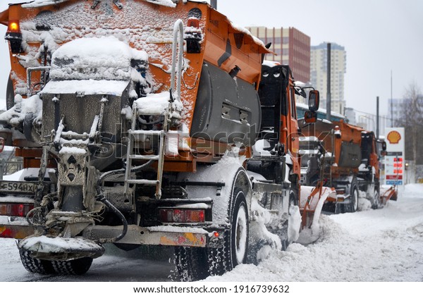 Snow removal equipment on snow-covered streets of
Moscow in winter