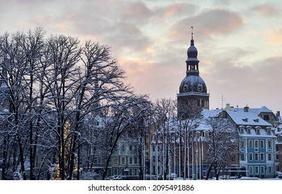 Snow scene in city with view on Orthodox church. High quality photo