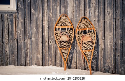 Snow Shoes Against A Wooden Barn