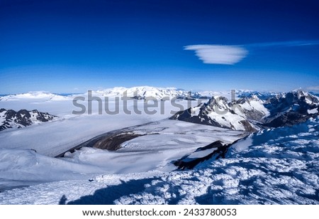 Snow slopes in Antarctica landscape. Antarctica landscape. Cold Antarctica mountains. Antarctica scene