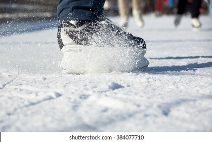 Snow Spray Of Skates On Ice Rink