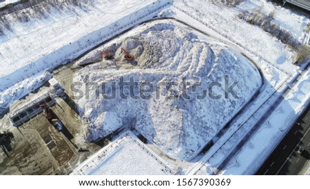 Snow storage at a snowmaking facility