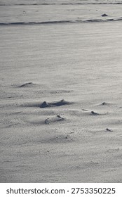 Snow Surface Patterns in Sunlight on Winter Snow Field