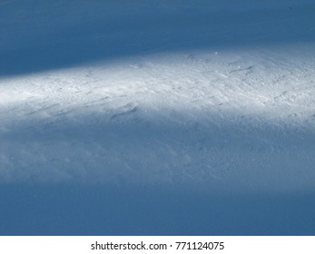 snow texture with rays of sunlight
