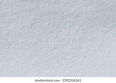 Snow texture. White surface of snow with clearly defined texture