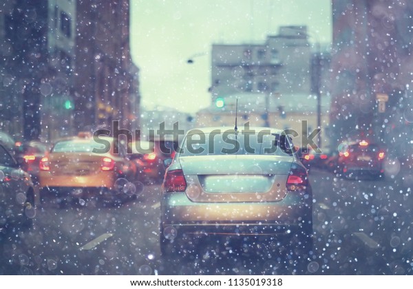 snow\
transport road city / landscape in a night city in winter, cars on\
the road in traffic jam in cold weather,\
snow