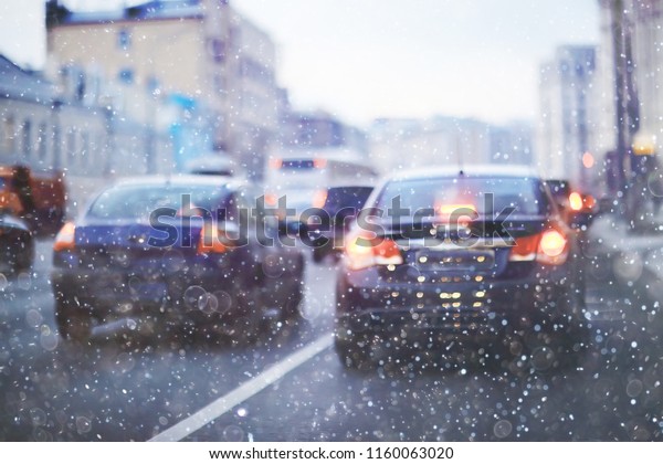 snow\
transport road city / landscape in a night city in winter, cars on\
the road in traffic jam in cold weather,\
snow