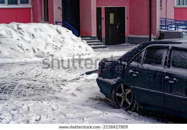 snow in the yard of the house after a heavy\
snowfall, Moscow