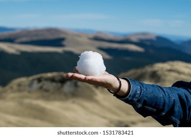 
Snowball In The Palm, Image With A Melting Snowball, Snow In The Mountains