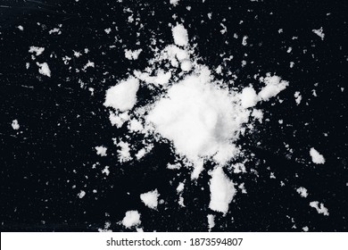 Snowball Splat On Black Wall