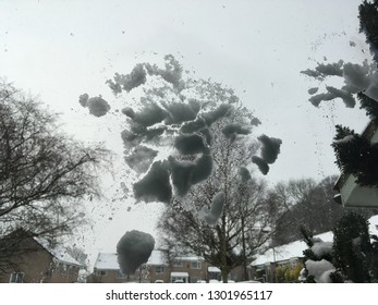 Snowball Thrown At Front Window Of House