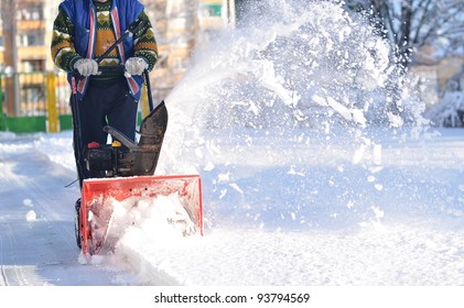 Snowblower In Winter