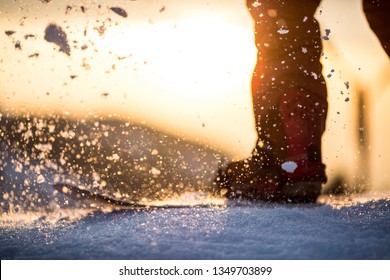 Snowboard Close Up At Sunset 