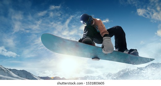 Snowboarder in action. Extreme winter sports. - Shutterstock ID 1531803605