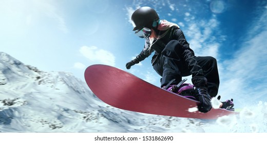 
Snowboarder in action. Extreme winter sports. - Shutterstock ID 1531862690