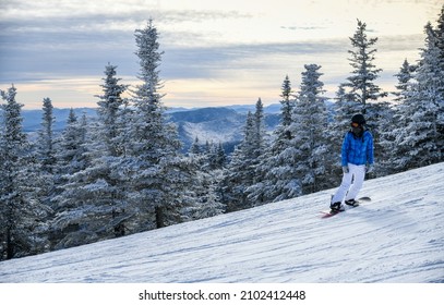 Snowboarder Enjoys The Stowe Mountain Resort.