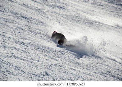 Snowboarder Fall In The Snow